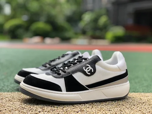 CHANEL 22 Panda Sneakers in Black and White