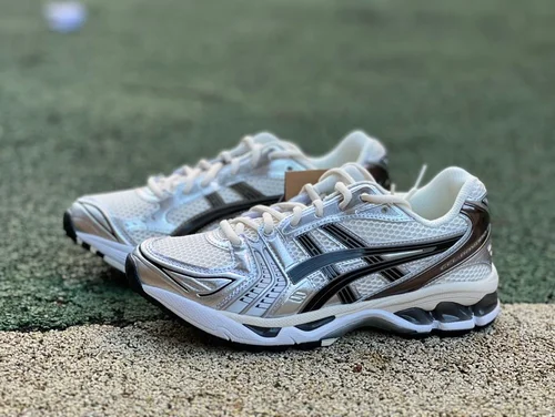 Asics Gel-Kayano 14 in Silver and White