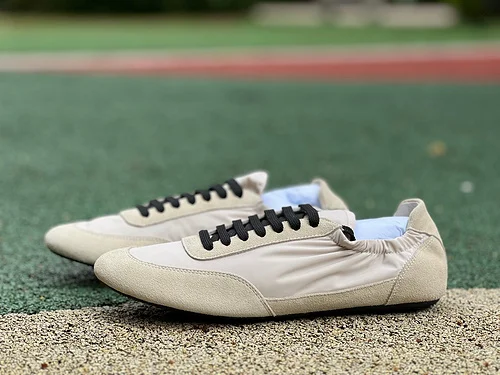 PRADA Collapse Ivory Suede Sneakers