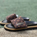 LOUIS VUITTON Monogram Print One-Strap Slides Brown