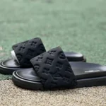 LOUIS VUITTON Monogram Print One-Strap Slides Black